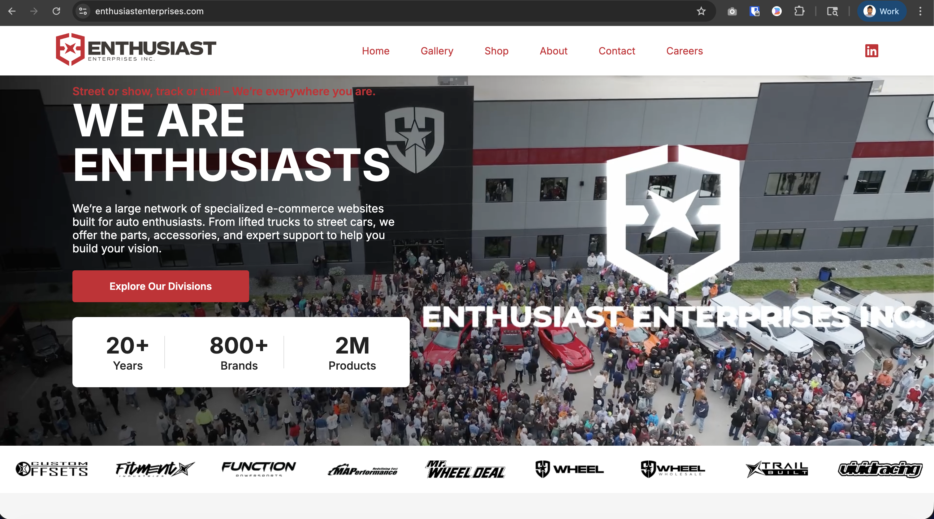 Enthusiast Enterprises homepage desktop — hero section with WE ARE ENTHUSIASTS headline, key stats, and division logo strip